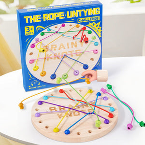 Children playing with a wooden Rope Untying Challenge Game promoting learning and coordination