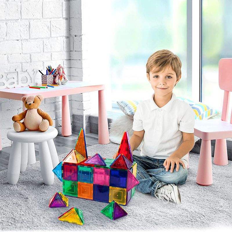 Colorful magnetic building tiles arranged in 3D transparent geometric shapes toy set for kids